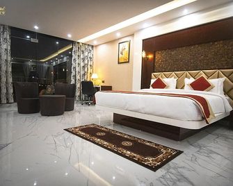 Hotel Raindew - Ranchi - Slaapkamer