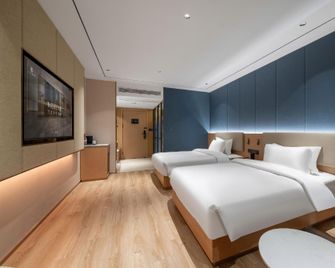 eLong Anyue Hotel (Shouxian Ancient City South Gate Jingrun Plaza Branch) - Huainan - Bedroom