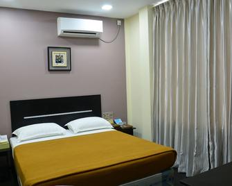 Mini Platinum Hotel - Rangún - Habitación