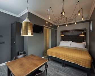 One - A Townhouse Hotel - רייקיאוויק - חדר שינה