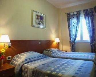 9 Muses Hotel - Skala - Slaapkamer