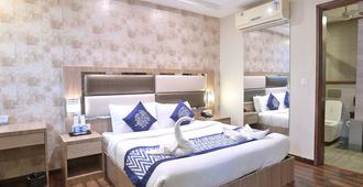 Hotel Inclover - Dharamshala - Phòng ngủ
