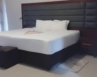 New View Luxury Inn - Seronga - Habitación