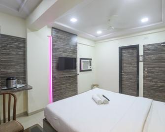 Hotel Mid town - Mumbai - Schlafzimmer