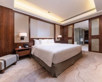 Howard Johnson Neodalle Resort Zhangjiajie - Zhangjiajie - Bedroom