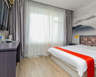Xinsanqi Hotel - Siping - Bedroom
