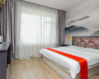 Xinsanqi Hotel - Siping - Bedroom