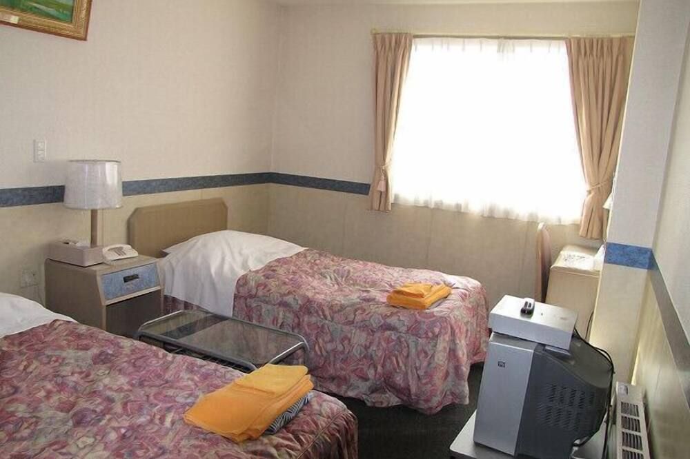 Business Hotel Motonakano - Tomakomai - Bedroom