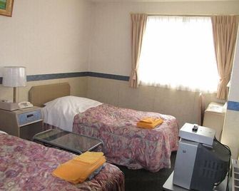 Business Hotel Motonakano - Tomakomai - Soveværelse