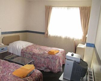 Business Hotel Motonakano - Tomakomai - Bedroom
