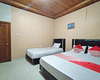 OYO 92291 Hotel Cahaya Syariah - Kuala Tungkal - Bedroom