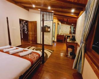 Omega Residency - Darjeeling - Ložnice