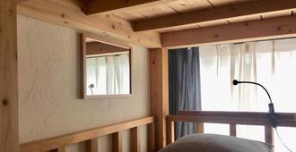 Guest House Golden Mile Hostel - Amami - Bedroom