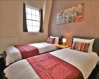 سنترال هوتل جلوستر باي رومز بوكد - غلوستر - غرفة نوم