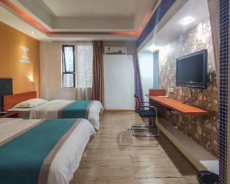 Qianjing Hotel Jiaoyu Branch - Yulin - Habitación