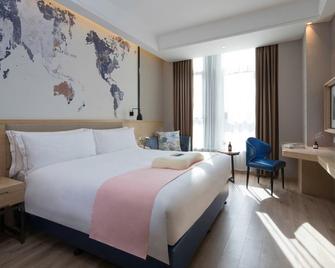 Kyriad Marvelous Hotel Guangzhou Shisanhang Shangxiajiu - Cantón - Habitación