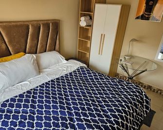 Seven Palms Executive Lodge - Ndola - Camera da letto