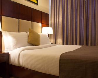 Seashells Millennium Hotel - Dar Es Salaam - Phòng ngủ