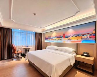 Vienna International Hotel (Shenzhen Yantian Port Hong'anwei Metro Station Branch) - Shenzhen - Bedroom