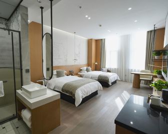 Longxingli Inn - Tonghua - Bedroom