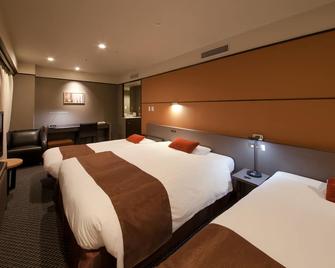 Matsuyama Tokyu Rei Hotel - Matsuyama - Slaapkamer