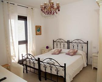 B&B La Casetta Nel Bosco - Castellana Grotte - Спальня