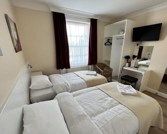 Melbourne House Hotel - Londra - Camera da letto