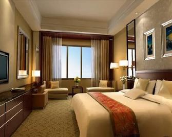 Yu Lin Petroleum Hotel - Yulin - Bedroom