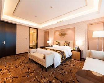 Neijiang International Hotel - Neijiang - Schlafzimmer