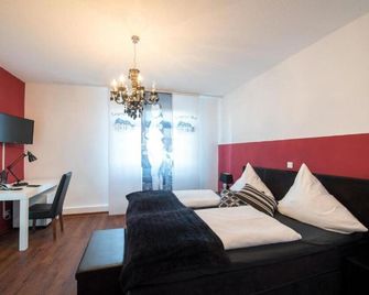 هوتل لايبزيجر هوف - فولدا - غرفة نوم