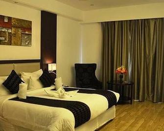 Hotel Sv- Kashipur - Kashipur - Bedroom