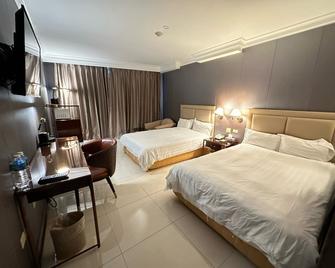 Royal Orchid Hotel Guam - טאמונינג - חדר שינה