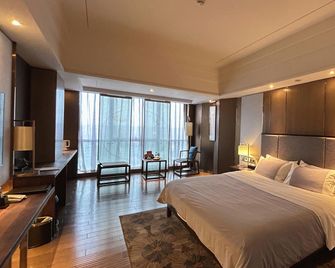 Century Sunshine Hotel Emeishan - Leshan - Schlafzimmer