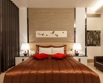 ليدون موتل - مدينة كاوهسيونغ - غرفة نوم