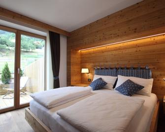 Dolomites B&b - Suites, Apartments And Spa - Tesero - Schlafzimmer
