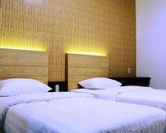 Hotel Kalang Ulu - Berastagi - Camera da letto