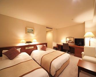 Hotel Harvest In Yonago - Йонаго - Спальня