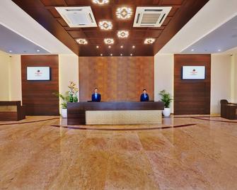 Manpho Bell Hotel & Convention Center - Bengaluru - Front desk