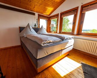 Landhaus am Silberberg, Ferienhaus im Grünen mit Sauna, Kamin und Großen Garten - Brakel - Bedroom