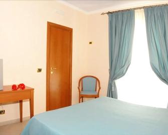 Hotel Residence Tramonto - Rodi Garganico - Makuuhuone