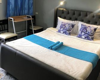 D Sanctum Resort - General Santos - Schlafzimmer