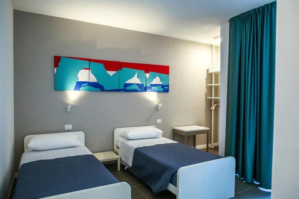 B&B WarmUp Grosseto - Parcheggio incluso nella corte interna - Grosseto - Chambre