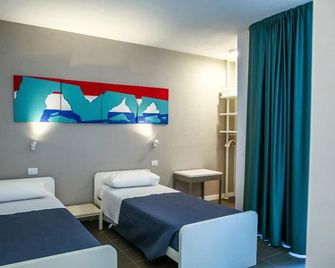 B&B WarmUp Grosseto - Parcheggio incluso nella corte interna - Grosseto - Chambre