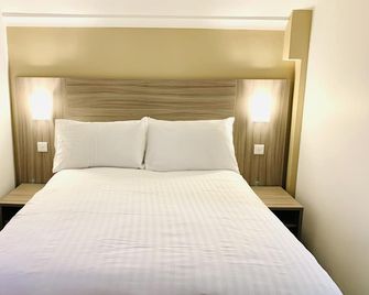 De Regency Style Hotel - Redditch - Schlafzimmer