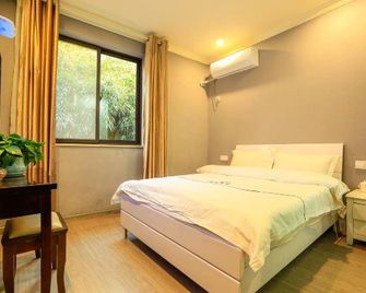 Yuanye Yunshu Hostel - Jiujiang - Bedroom