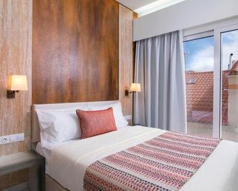 Molos Hotel - Potos - Schlafzimmer