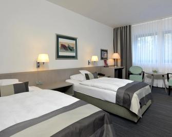 Hotel Spiegel - كولونيا - غرفة نوم