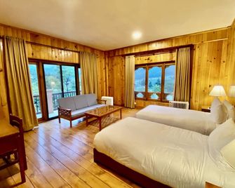 Taktsang Village Resort - פארו - חדר שינה