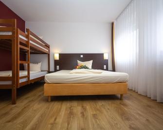 Iq Hotel - Langenau - Slaapkamer