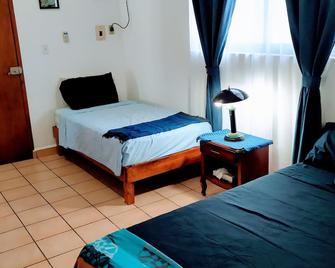 Alicia's Bed & Breakfast - Cozumel - Schlafzimmer